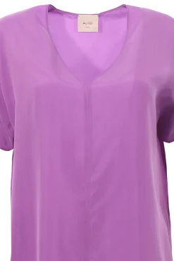 Blusa in seta collo a v