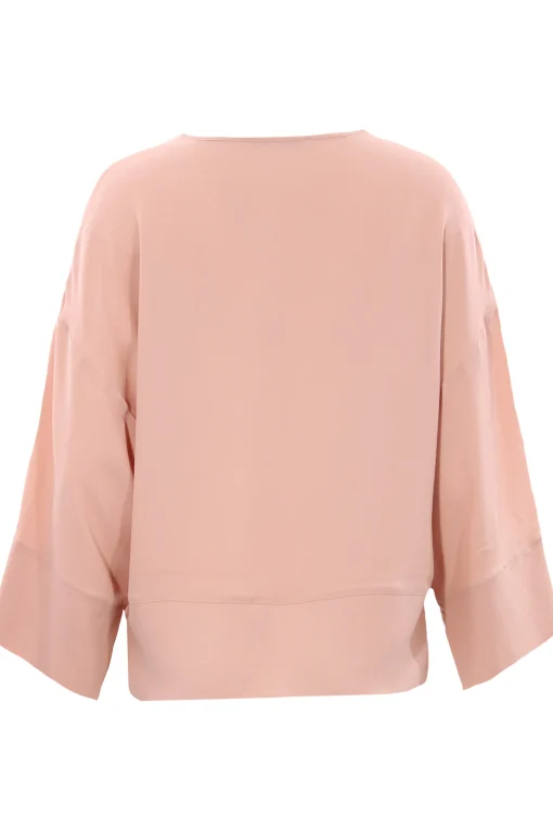 Blusa in seta con applicazione monile