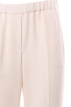 Pantalone gamba stretta con risvolto