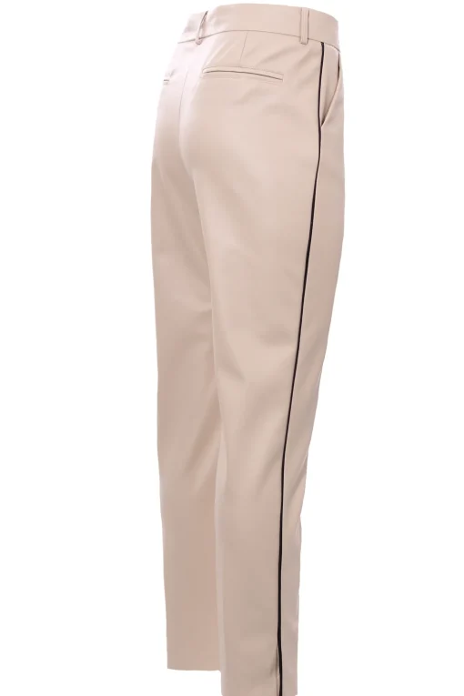 Pantaloni in ecopelle con piping laterale